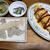 ひき肉とじゃがいものオムレツとヒラメの刺身。ざるうどん
