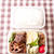 お弁当（真夜中制作）『ぎゅっと握った豚こまの梅トマジャムコチュジャン味』