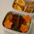 お弁当（ハンバーグ・ピリ辛トマトソース）