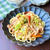 フライパン10分完成☆豚こまとキャベツたっぷりのガーリックアンチョビうどん