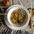 煮しめのグラタンスープ　ぽんせん入り　baked rooted vege broth with rice cake soup