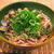 あさりとなめこの梅うどん♪たっぷりねぎ乗せ