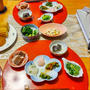 BBQのお残し食材で。芋煮鍋とメンチやとうもろこしと小鉢８品。銀杏や漬物で晩酌