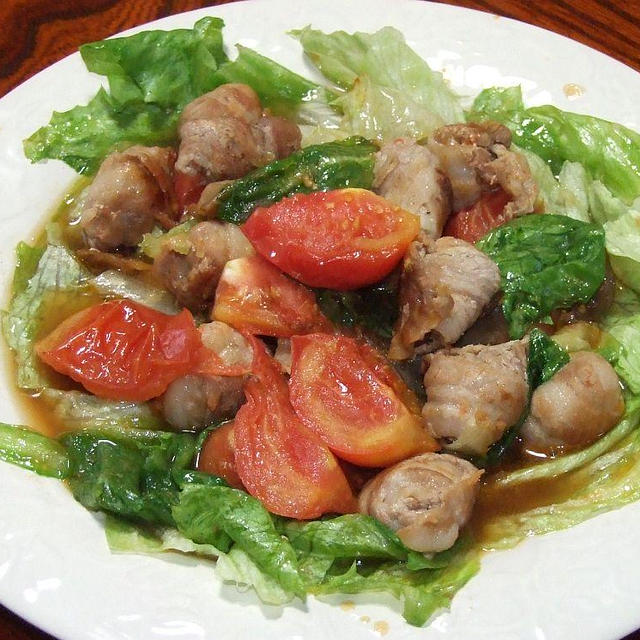豚バラ肉のクルクル巻きトマトとザーサイ炒め