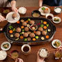 HAPPY WOMAN　3月8日　国際女性デー　ホットプレート料理を囲む食卓