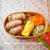 お雛祭りだけど、長ネギの巻き巻きと五目ご飯のお弁当