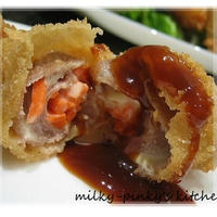 豚薄切りのカツ、クルミ豆腐、茎わかめのナムル。