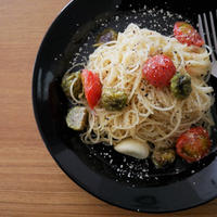 「福島県産ふきのとう」とミニトマトのペペロンチーノスパゲッティ