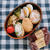 いなり寿司弁当（ゆで卵、青梗菜とベーコンの煮びたし、ふきたけのこ、ミニトマト）