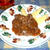 牛肉のトマト・ワイン煮込み（spezzatino di manzo al pomodoro e vino)