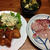 から揚げと鯛の刺し身。凛々しいきなこ