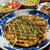 残りお好み焼き風と、アボカドとまと納豆と、鶏軟骨味焼きと、浅漬け。