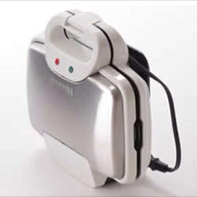 巻いて挿すコードの収納