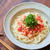 【｢カルピス｣レシピ】トマトツナのピリ辛混ぜうどん
