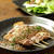 焼鳥、豚バラ串の玉ねぎソースかけ
