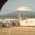 傘をかぶった富士山を眺めつつ