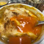 半熟卵を絡めて頂く焼きカレー