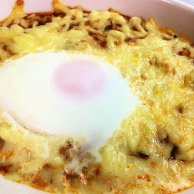 二日前の秋刀魚とトマト缶を煮込んだ残り汁でチーズリゾット風に♪