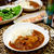 豚バラカレーとおつまみとのんある。