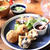 黒豆コロッケ定食。黒豆煮入りヨーグルトプリン（フーディストノート）。