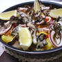 残ったご飯で簡単に。牡蠣とイカと舞茸の季節のパエリア。