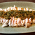 最高お刺身感。たたきチキンの焦がし豆苗柚子胡椒ジュレ。（糖質4.5g）