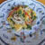 オレンジジュースとオレンジのパスタ